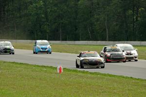 Jason Cherry's Mazda MX-5 passes the TCB battle