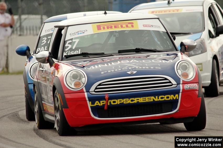 Andrei Kisel's MINI Cooper, Tyler Palmer's MINI Cooper and P.J. Groenke's Honda Fit