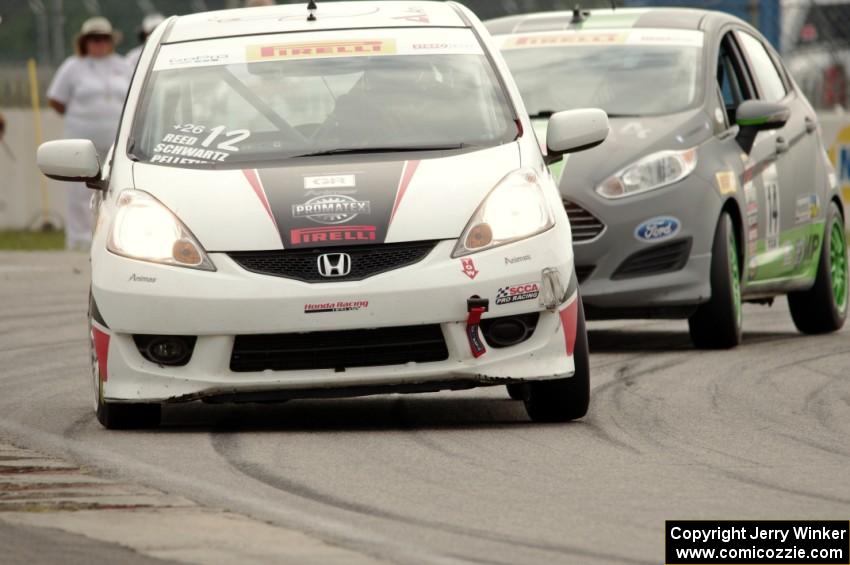 Johan Schwartz's Honda Fit and Nate Stacy's Ford Fiesta