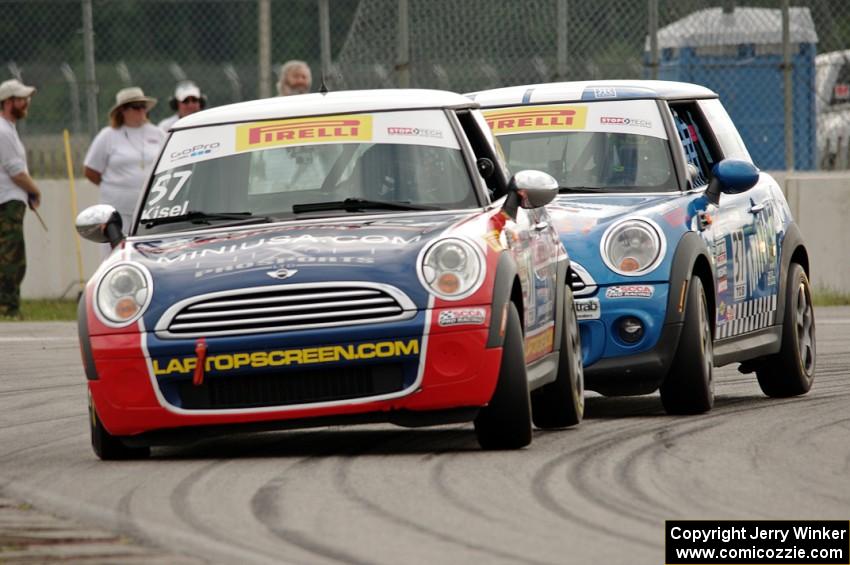 Andrei Kisel's and Tyler Palmer's MINI Coopers