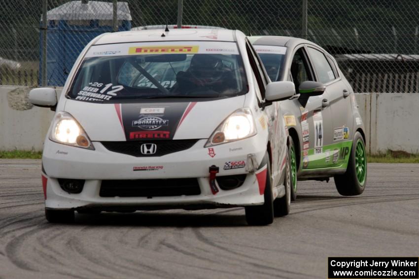 Johan Schwartz's Honda Fit and Nate Stacy's Ford Fiesta