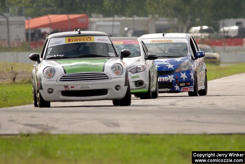 Jason Fichter's MINI Cooper, Jason Wolfe's Kia Forte Koup and Brian Price's Honda Fit