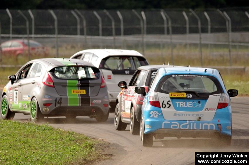 Johan Schwartz's Honda Fit, Nate Stacy's Ford Fiesta, Glenn Nixon's MINI Cooper and Paul Holton's Honda Fit