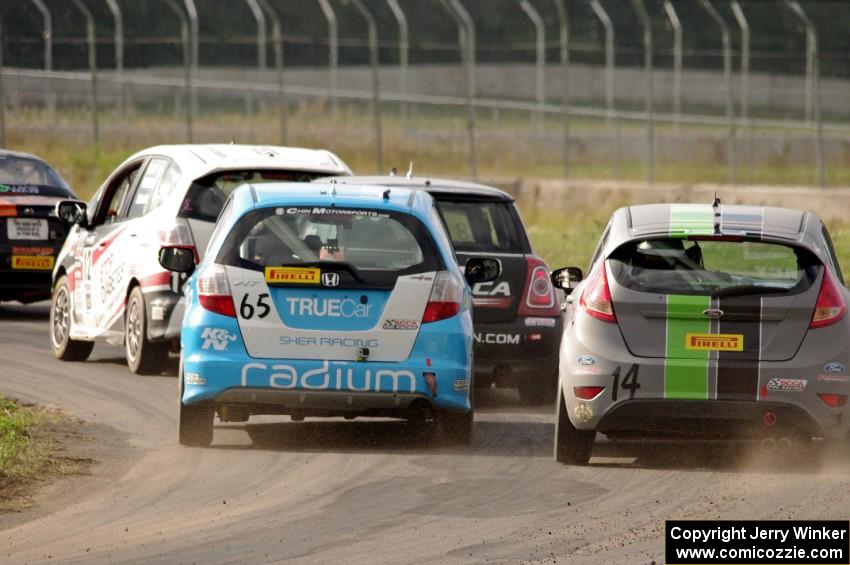 Johan Schwartz's Honda Fit, Glenn Nixon's MINI Cooper, Paul Holton's Honda Fit and Nate Stacy's Ford Fiesta