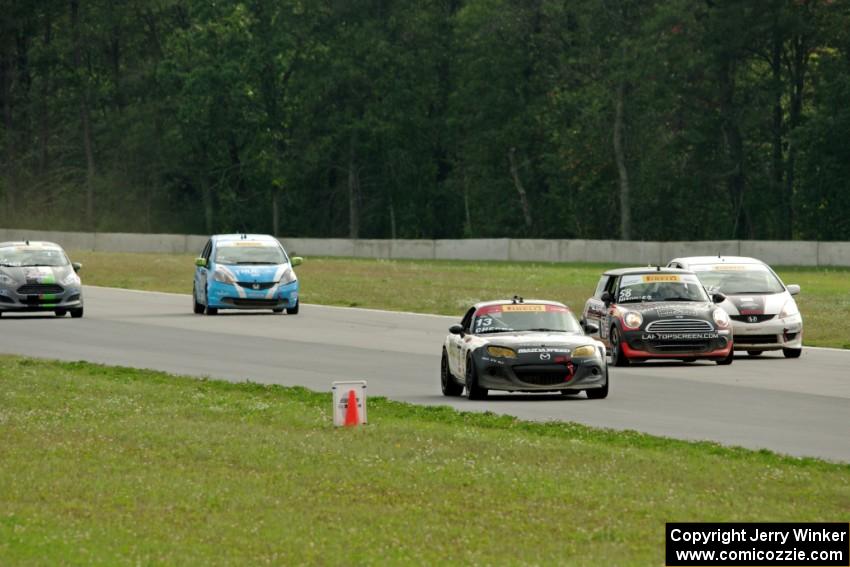 Jason Cherry's Mazda MX-5 passes the TCB battle