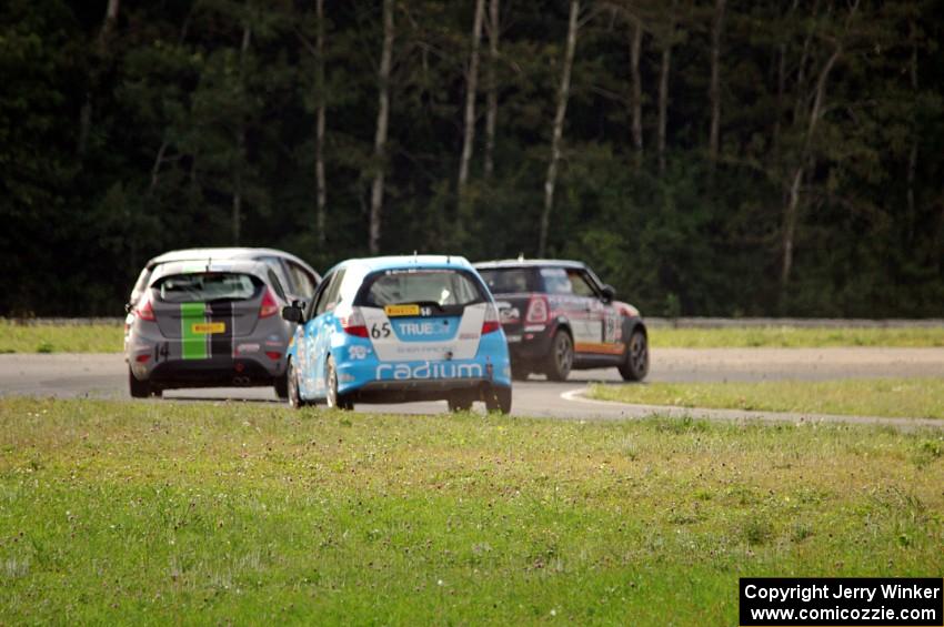 Glenn Nixon's MINI Cooper, Johan Schwartz's Honda Fit, Nate Stacy's Ford Fiesta and Paul Holton's Honda Fit