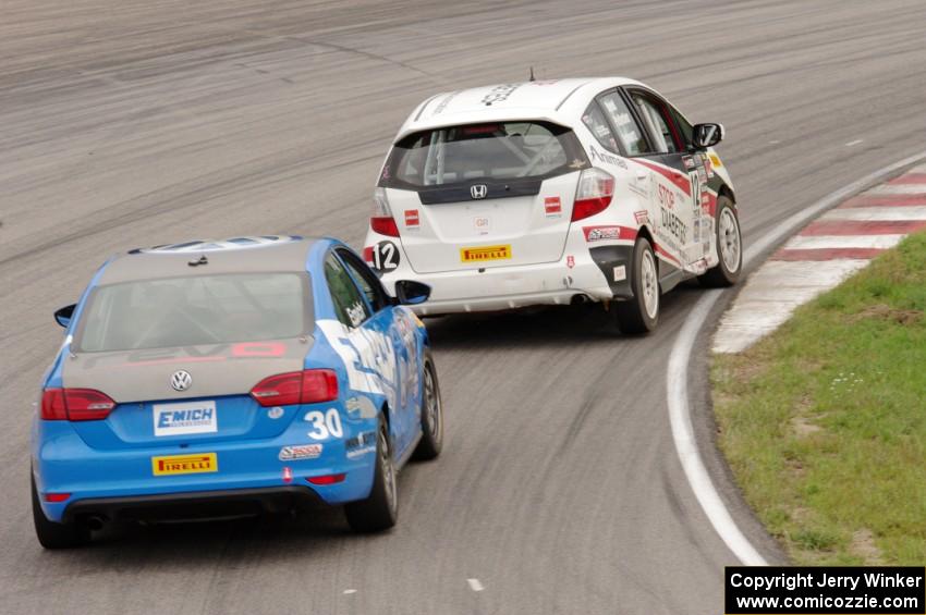 Johan Schwartz's Honda Fit and Fred Emich's VW Jetta GLI