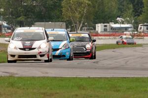 Johan Schwartz's Honda Fit, Paul Holton's Honda Fit and Glenn Nixon's MINI Cooper