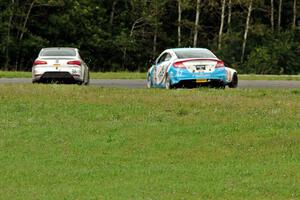 2nd through 4th in TCA - Jason Cherry's Mazda MX-5, Jason Wolfe's Kia Forte Koup and Shea Holbrook's Honda Civic Si