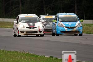 Paul Holton's Honda Fit, Johan Schwartz's Honda Fit and Glenn Nixon's MINI Cooper