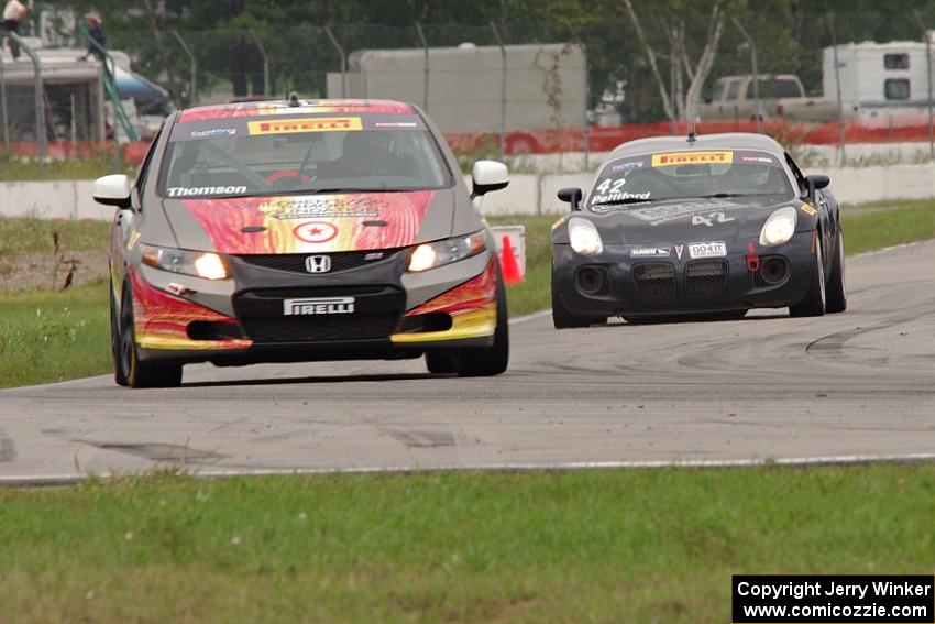 Karl Thomson's Honda Civic Si and Michael Pettiford's Pontiac Solstice