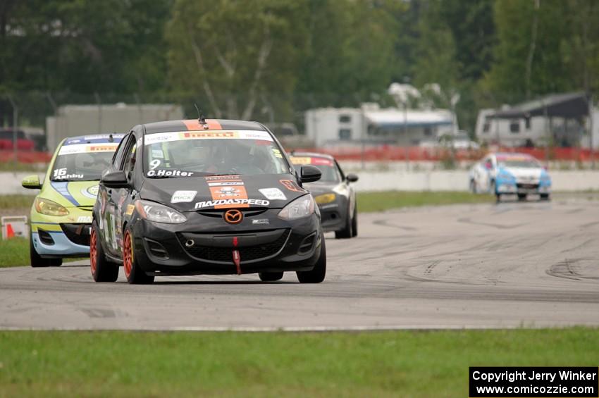 Chris Holter's Mazda 2 and Michael Ashby's Mazda 2