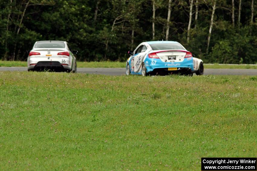 2nd through 4th in TCA - Jason Cherry's Mazda MX-5, Jason Wolfe's Kia Forte Koup and Shea Holbrook's Honda Civic Si