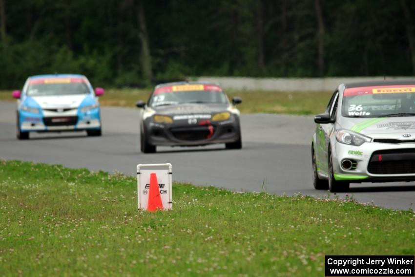 Jason Wolfe's Kia Forte Koup, Jason Cherry's Mazda MX-5 and Shea Holbrook's Honda Civic Si