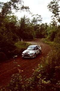 Pete Lahm / Matt Chester Mitsubishi Lancer Evo IV at speed on SS1, Waptus.