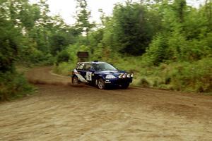 Bryan Hourt / Tom Tighe Honda Civic at speed on SS1, Waptus.