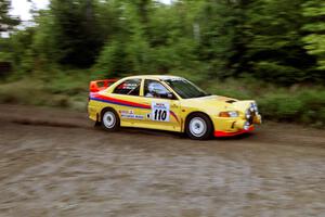 Mark Nelson / John Dillon Mitsubishi Lancer Evo IV at speed on SS1, Waptus.