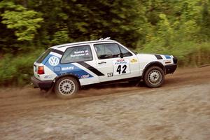 Eric Burmeister / Mark Buskirk VW GTI at speed on SS1, Waptus.