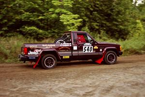 Scott Carlborn / Dale Dewald Jeep Comanche at speed on SS1, Waptus.