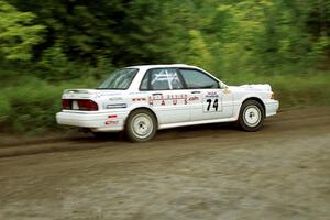 Ramana Lagemann / Bill Washburn Mitsubishi Galant VR-4 at speed on SS1, Waptus.