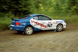 Larry Webster / J. Jon Wickens Hyundai Tiburon at speed on SS1, Waptus.