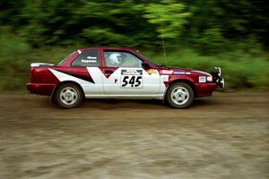 Eric Seppanen / Jake Himes Nissan Sentra SE-R at speed on SS1, Waptus.