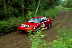 Steve Irwin / Phil Schmidt Toyota MR-2 at speed on SS1, Waptus.