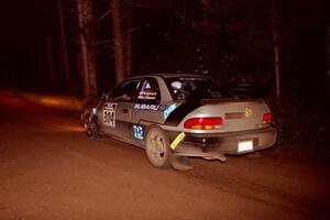 Lon Peterson / Bill Gutzmann Subaru Impreza 2.5RS at speed on SS5, Hanna One.