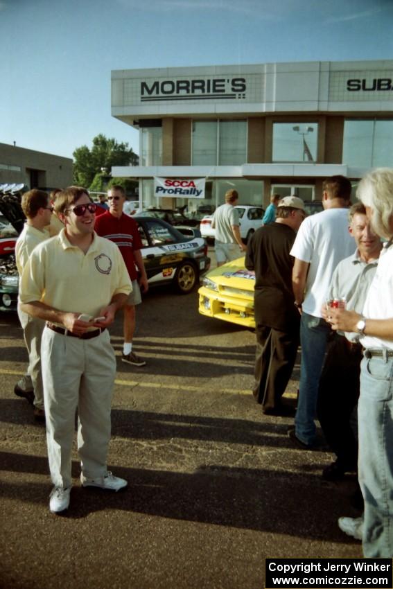 Paul Eklund speaks to rally fans at Morrie's Subaru.