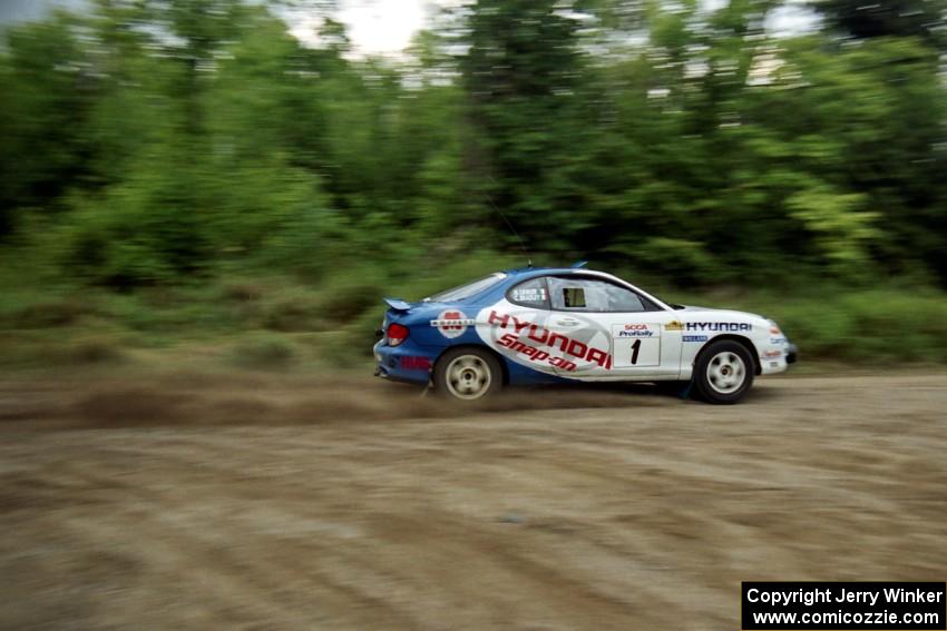 Noel Lawler / Charles Bradley Hyundai Tiburon at speed on SS1, Waptus.