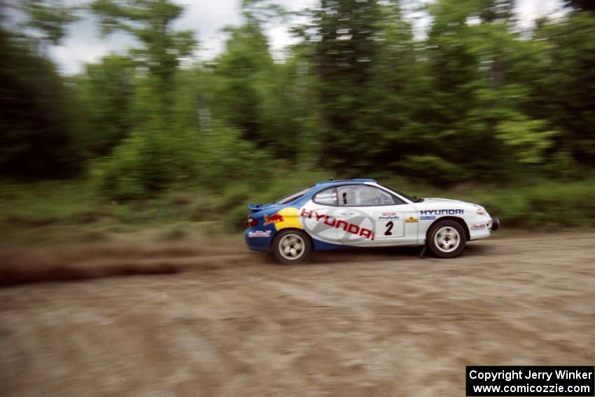 Paul Choiniere / Jeff Becker Hyundai Tiburon at speed on SS1, Waptus.