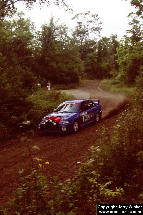 Peter Cunningham / Jim Gill Mitsubishi Lancer Evo VI at speed on SS1, Waptus.