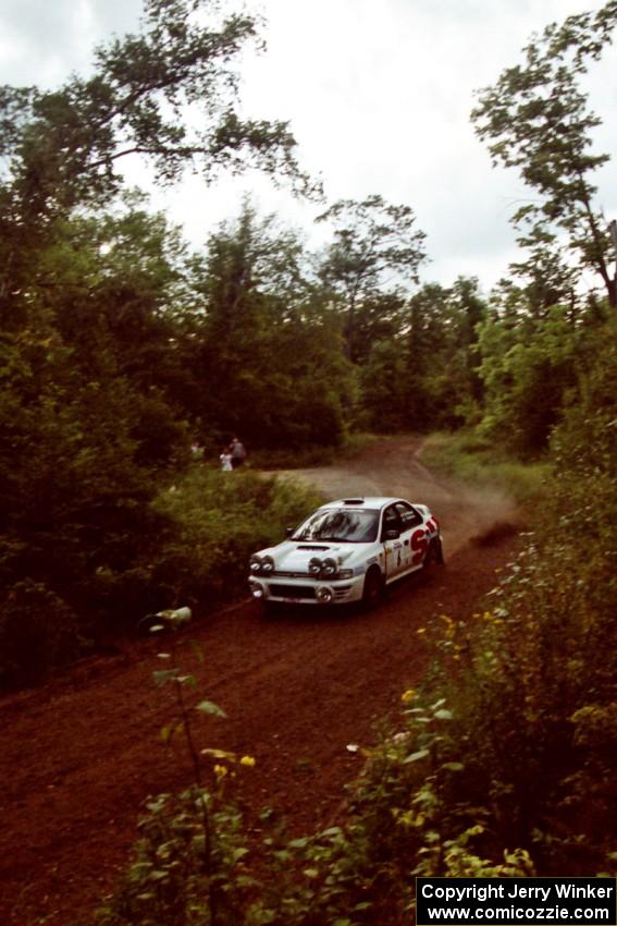 Henry Krolikowski / Cindy Krolikowski Subaru WRX STi at speed on SS1, Waptus.