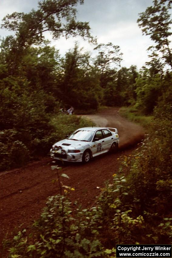 Seamus Burke / Frank Cunningham Mitsubishi Lancer Evo IV at speed on SS1, Waptus.