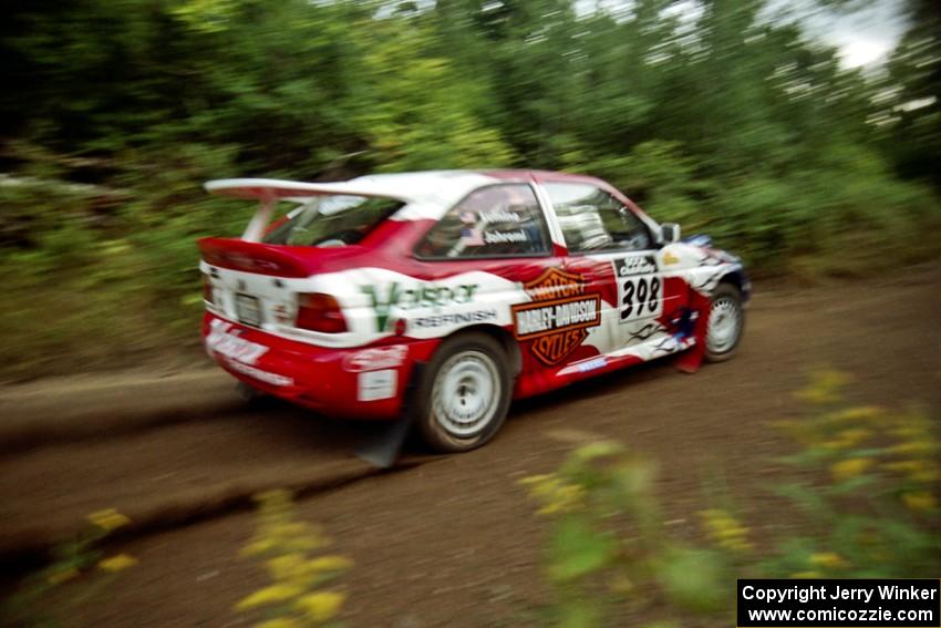 Kurosh Jahromi / Tony Lumino Ford Escort Cosworth RS at speed on SS1, Waptus.