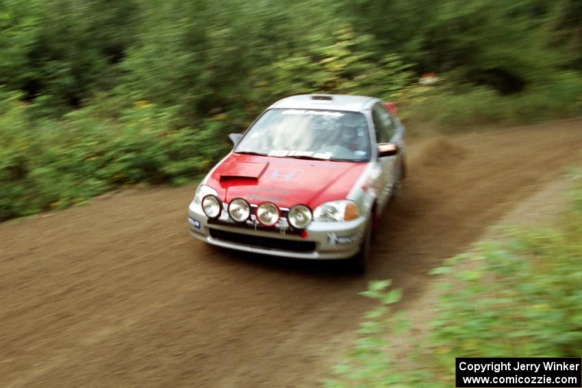 Nick Robinson / Carl Lindquist Honda Civic at speed on SS1, Waptus.