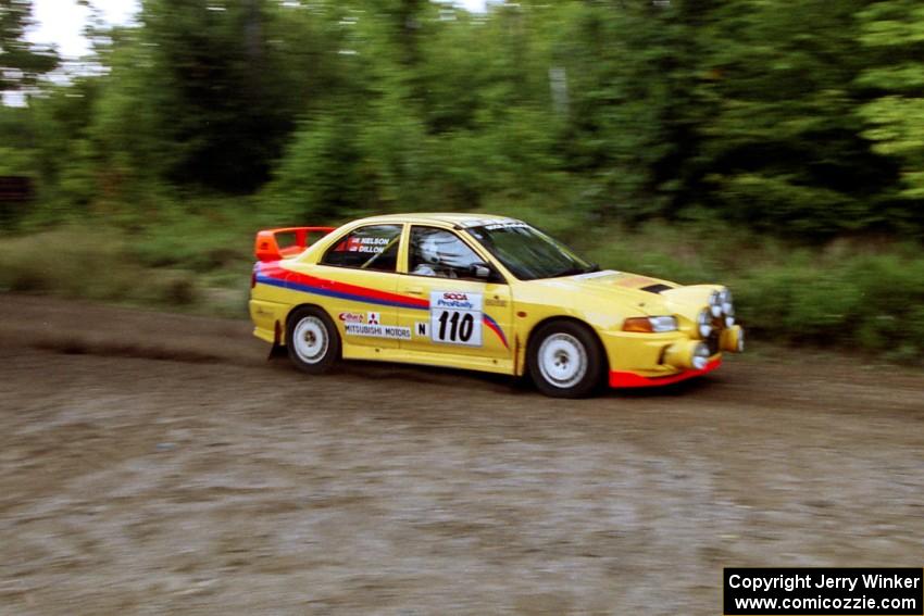 Mark Nelson / John Dillon Mitsubishi Lancer Evo IV at speed on SS1, Waptus.