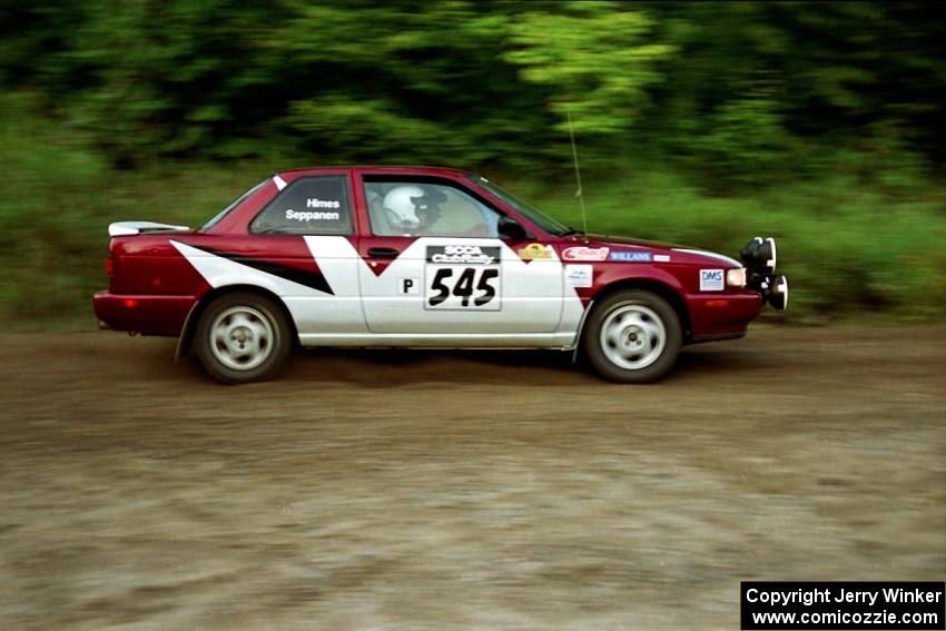 Eric Seppanen / Jake Himes Nissan Sentra SE-R at speed on SS1, Waptus.