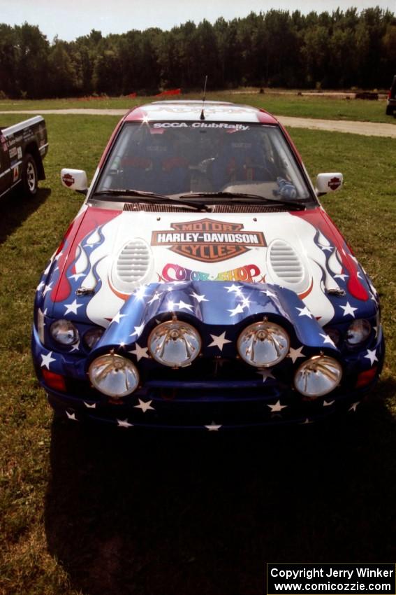 Kurosh Jahromi / Tony Lumino Ford Escort Cosworth RS at parc expose prior to SS8, Speedway Shennanigans.