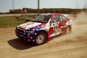 Kurosh Jahromi / Tony Lumino Ford Escort Cosworth RS on SS8, Speedway Shennanigans.