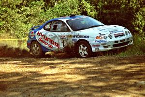 Noel Lawler / Charles Bradley Hyundai Tiburon at the spectator corner on SS10, Kabekona.