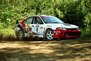 Garen Shrader / Michael Fennell Mitsubishi Lancer Evo IV at the spectator corner on SS10, Kabekona.