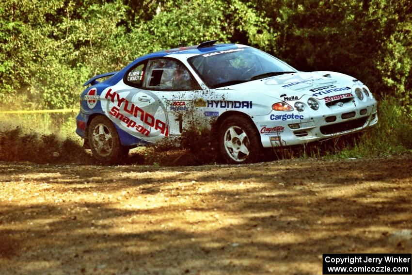 Noel Lawler / Charles Bradley Hyundai Tiburon at the spectator corner on SS10, Kabekona.