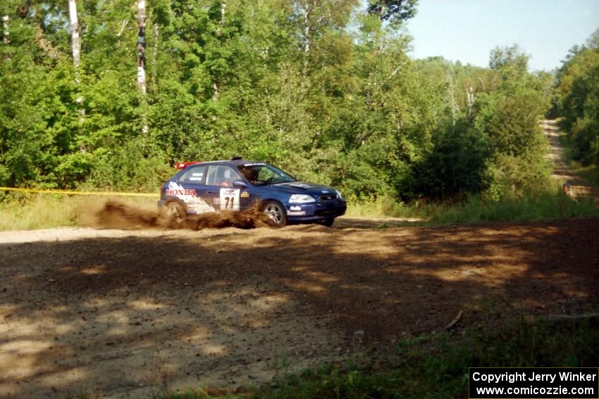 Bryan Hourt / Tom Tighe Honda Civic at the spectator corner on SS10, Kabekona.