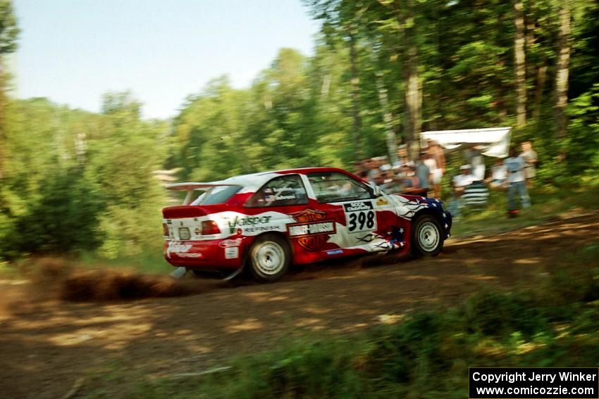 Kurosh Jahromi / Tony Lumino Ford Escort Cosworth RS at the spectator corner on SS10, Kabekona.