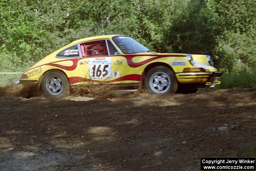 Dennis Chizma / Claire Chizma Porsche 911 at the spectator corner on SS10, Kabekona.