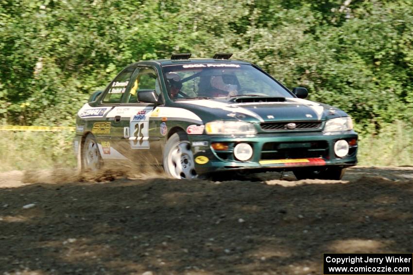 Lee Shadbolt / Bob Sherman Subaru Impreza at the spectator corner on SS10, Kabekona.