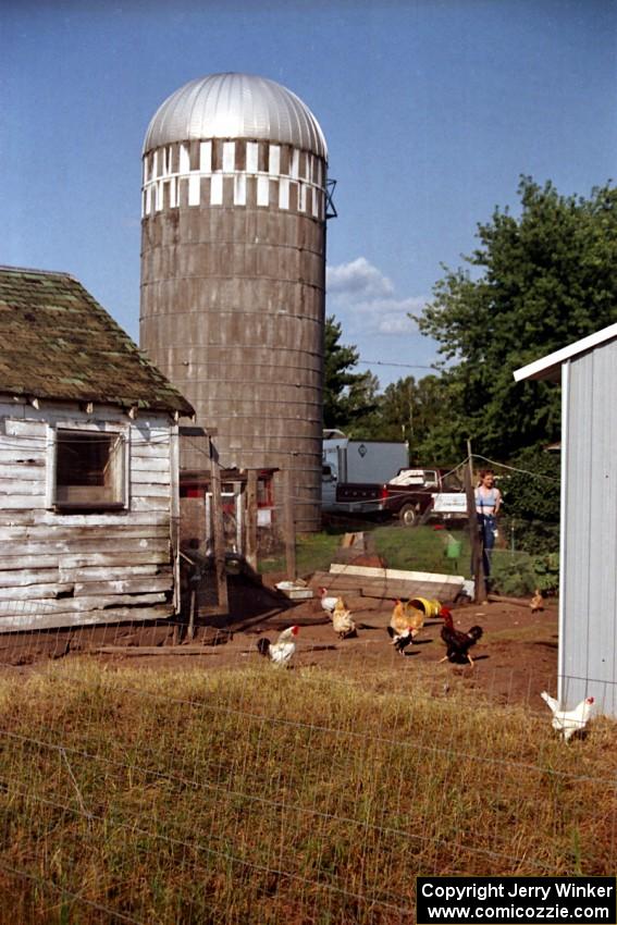 Diane Sargent checks out the farmer's chickens at Saturday mid-day service at the ranch.