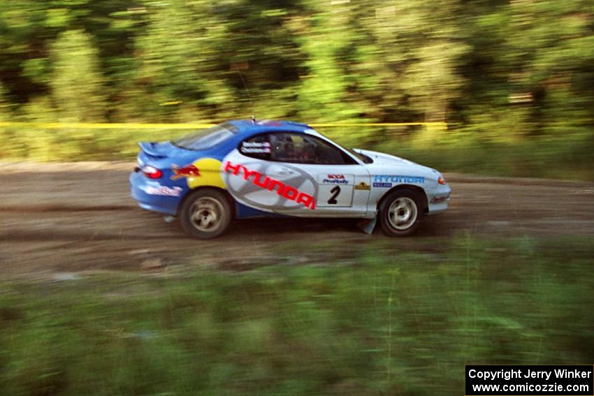 Paul Choiniere / Jeff Becker Hyundai Tiburon at speed on SS14, East Steamboat.