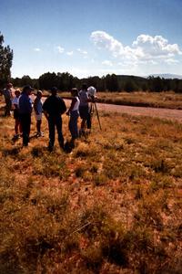 Photographers, camera crew and Noel Lawler converse at the flying finish of SS6 on Saturday.